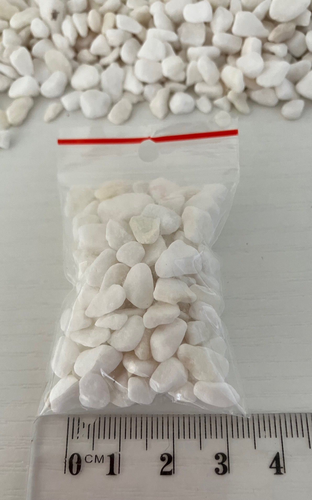 Bag of white pebbles